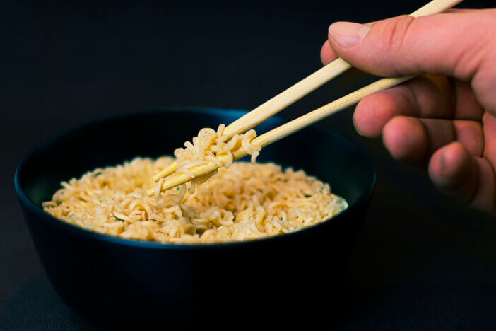 Eating Instant Ramen Noodles