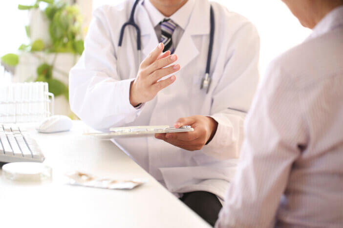 Doctor explaining to patient