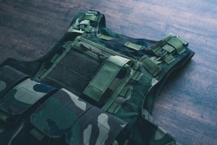 Woodland camouflaged body armor