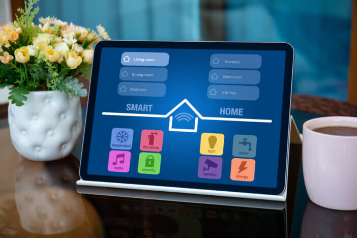 computer tablet with app smart home on screen in home