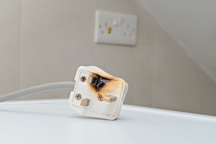 Burned 250V uk style socket and converter. Improper use of AC Power Plugs and Sockets cause of short circuit and fires at home