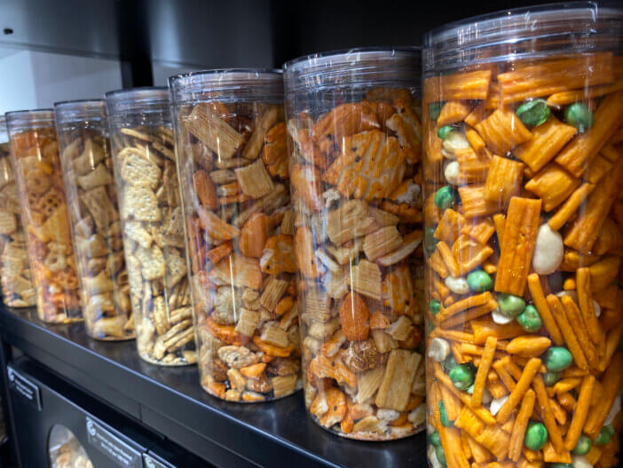 Crunchy snacks and ready to eat food including chips, nuts etc