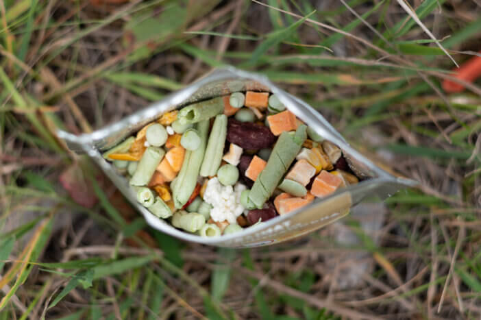A set of freeze-dried food in a bag. Tourist freeze-dried food. View from above.