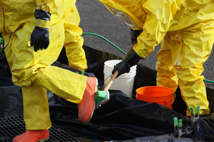 Fire departments and emergency response teams will conduct disaster preparedness drills. These HAZMAT team members have been wearing protective suits to protect them from hazardous materials during a disaster preparedness drill and have to go through decontamination washes.
