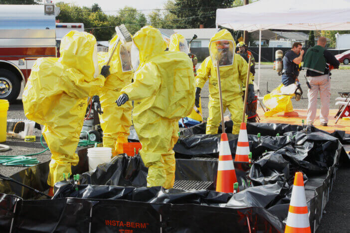 "Eugene, Oregon, USA aa November 3, 2011: Fire departments and emergency response teams will conduct disaster preparedness drills. This drill is the combination of various fire departments from Eugene, Lane County, and other nearby emergency services."