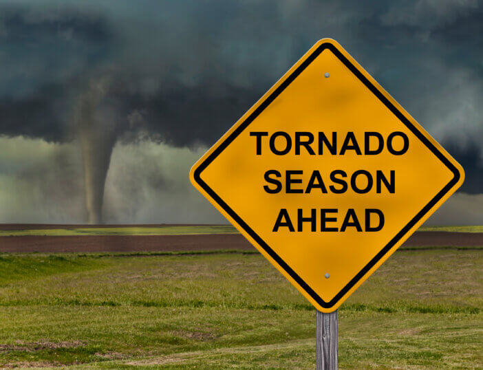 Tornado Season Ahead Caution Sign With Tornado Background