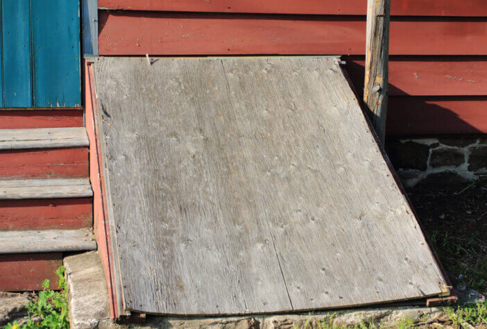Storm cellar under a barn.