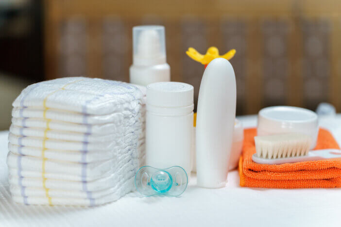 accessories for newborn baby necessities on the white table