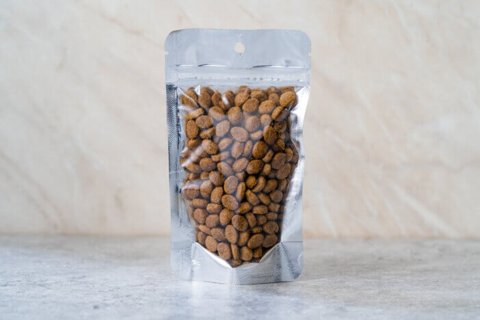 Packed Dog Food For Sale in Plastic Package Container. Ready to Use.