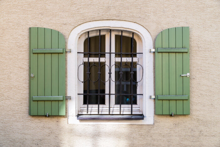 Barred window with shutter
