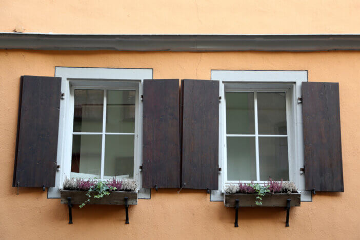 Shuttered windows - Old houses with shuttered windows
