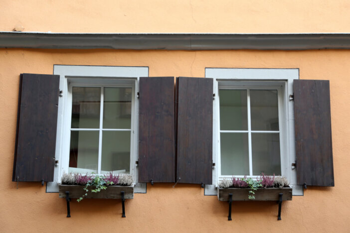 Shuttered windows - Old houses with shuttered windows